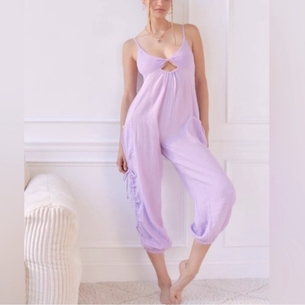 Out from under purple romper